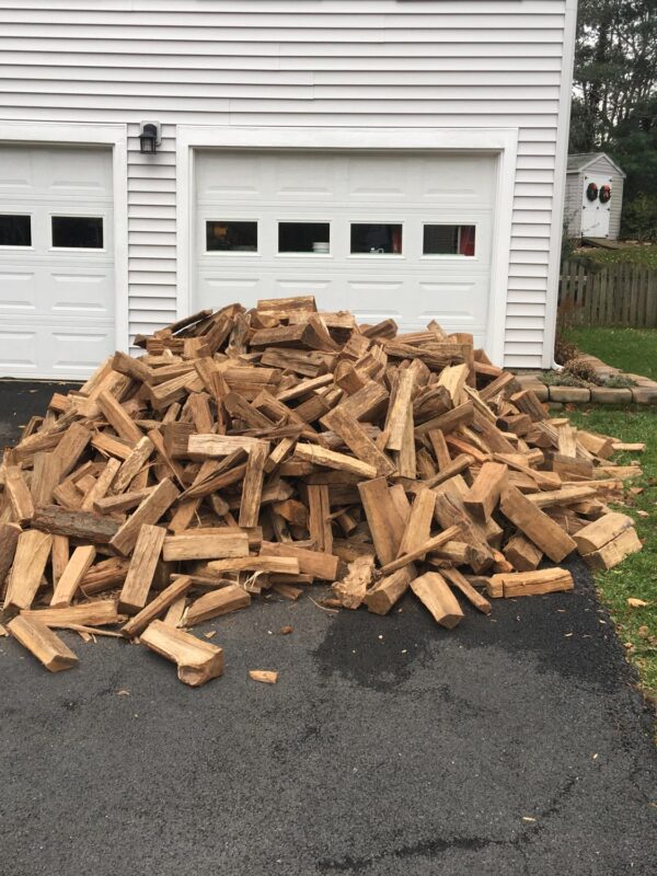 Full Cord of firewood on a driveway